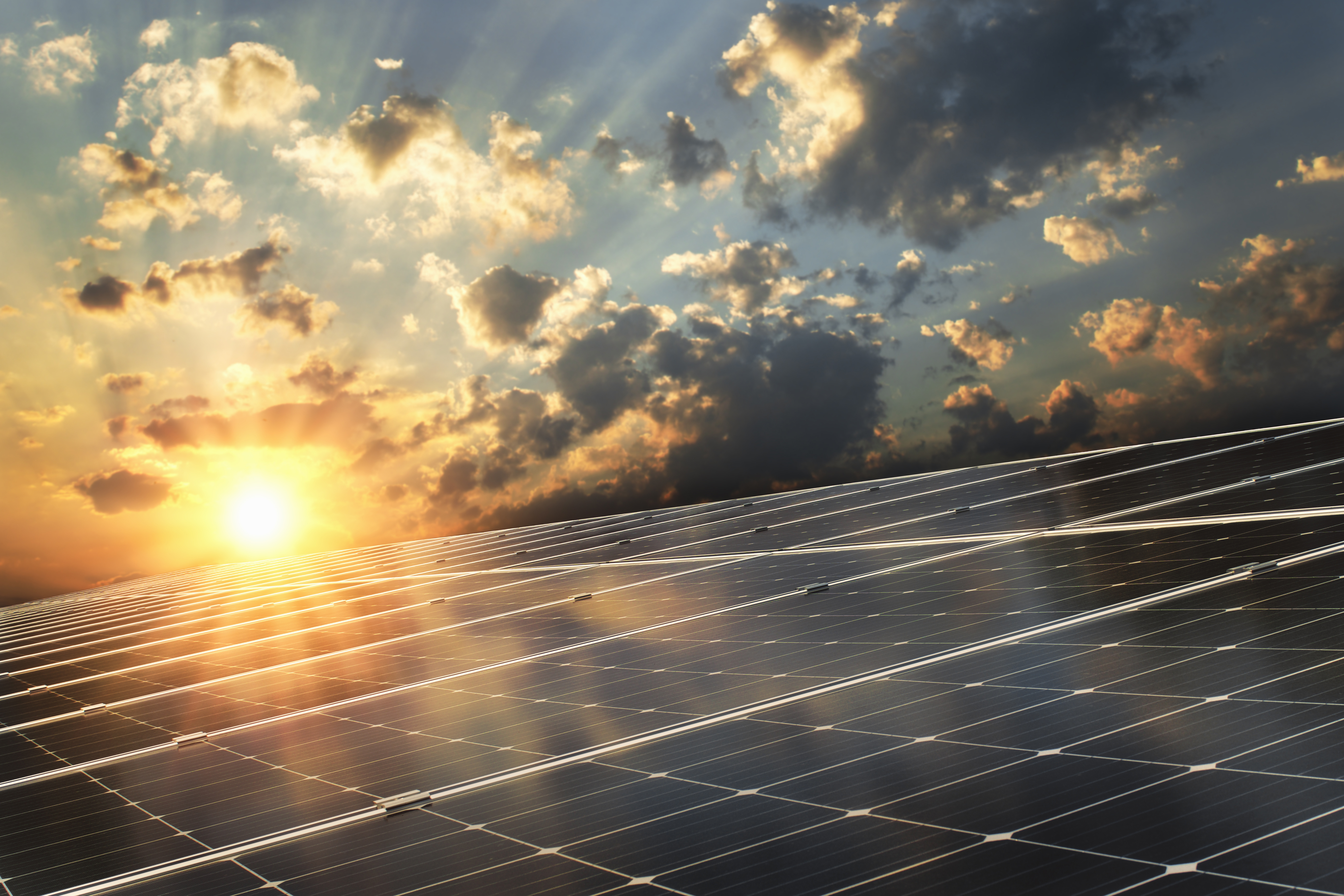 Sun shining on solar panels