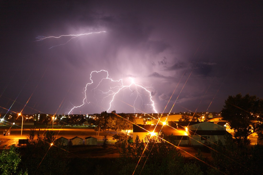Lightning strikes over city